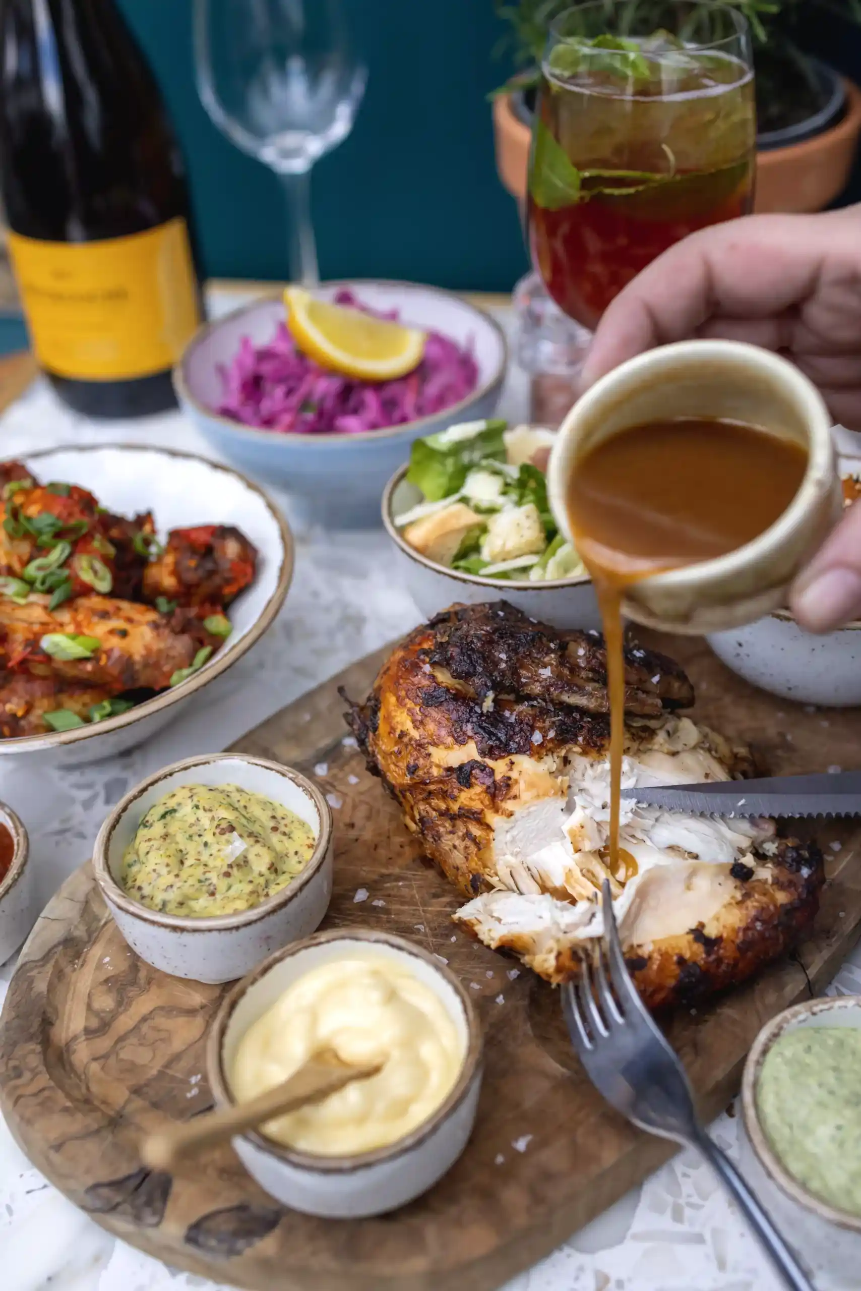 Secret Sauce poured on roasted chicken