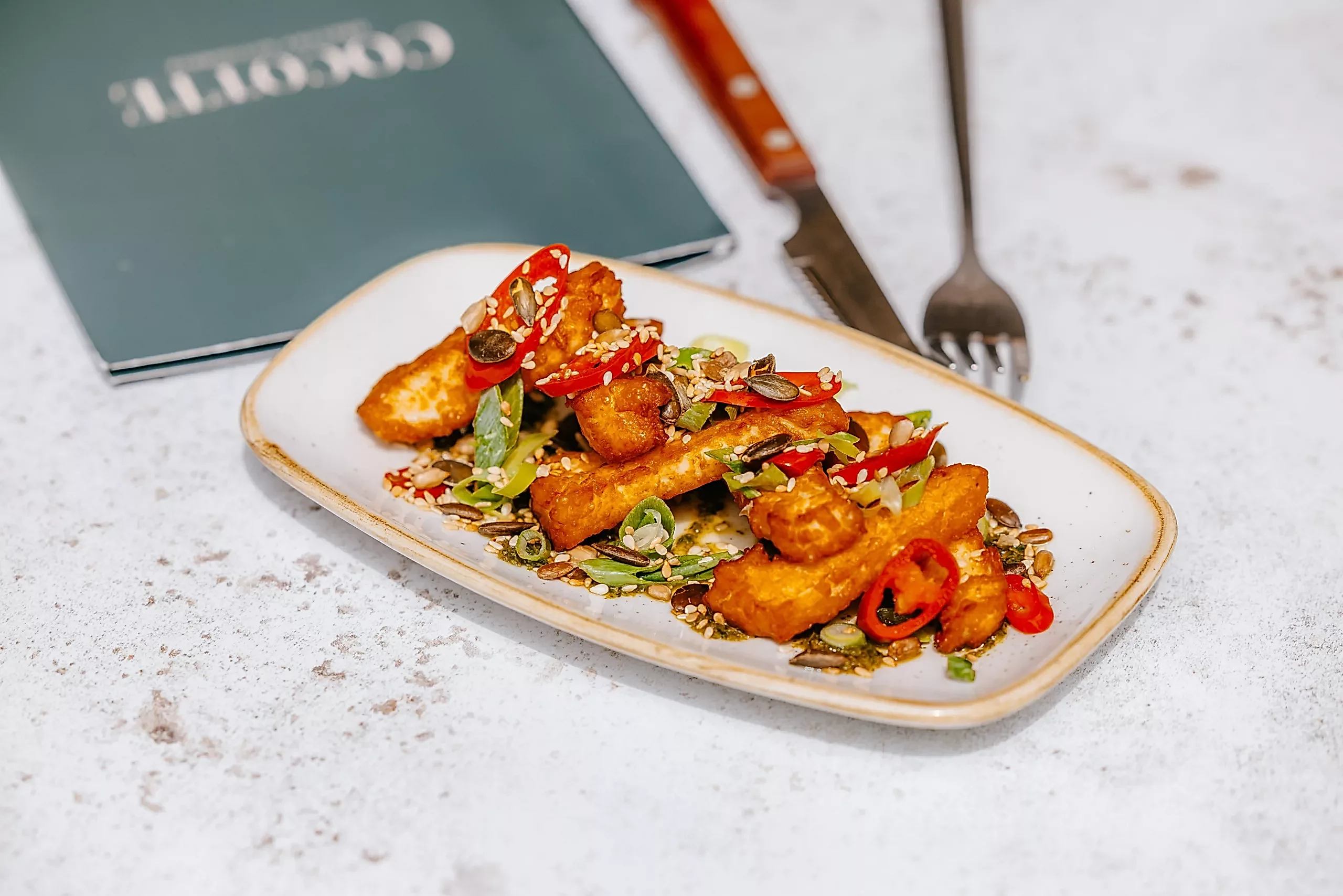 Warm salad on a table at Cocotte