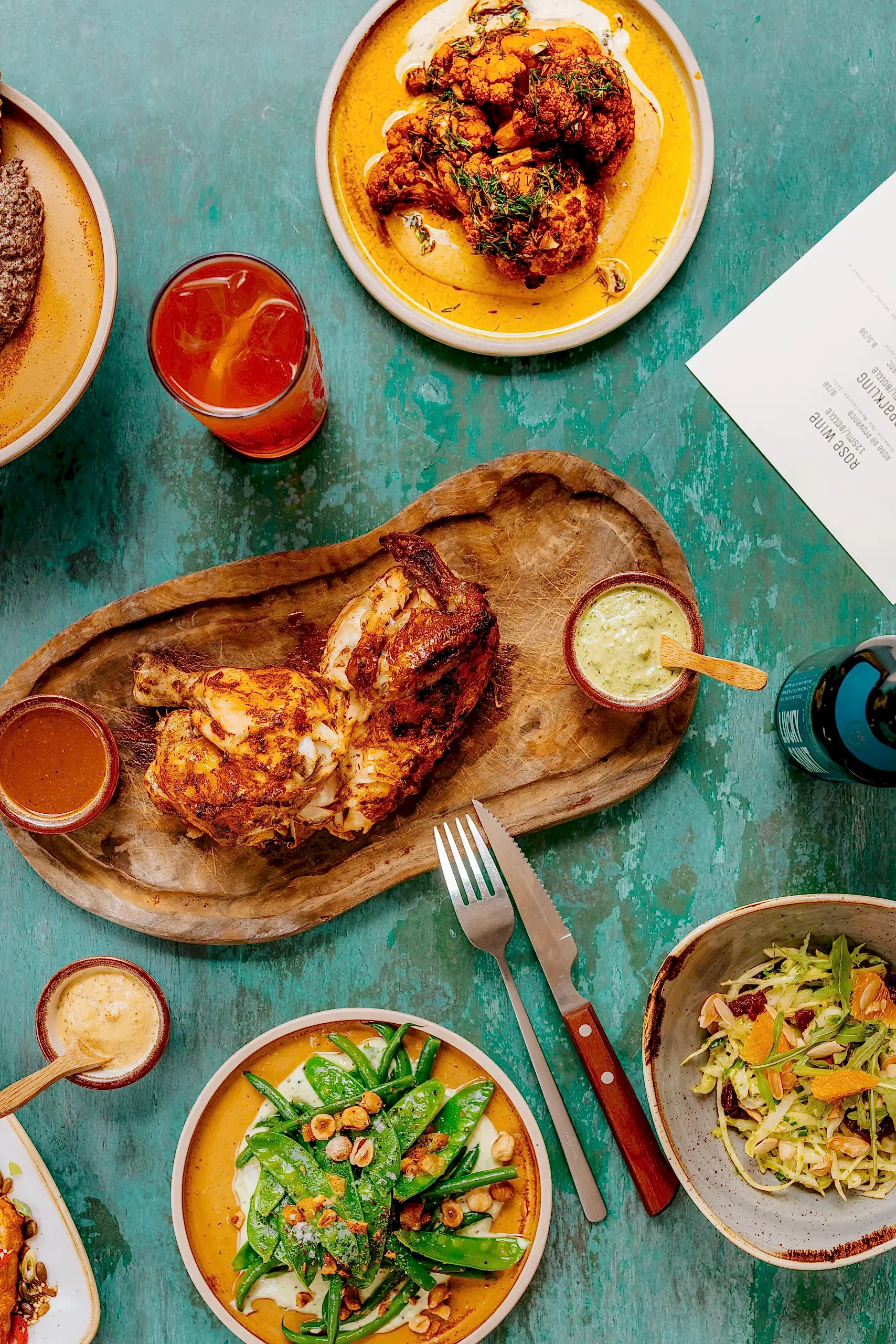 Roasted Chicken served on the table along with the secret sauce